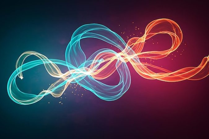 Des volutes d'énergie bleues et orange s'entrelacent pour illustrer comment savoir si quelqu'un pense à moi : 7 signes spirituels et énergétiques à travers une connexion invisible.